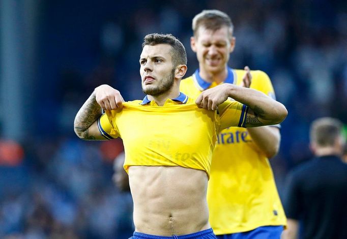 Wilshere a Mertesacker z Arsenalu v anglické Premier League