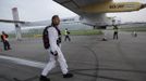 Solar Impulse CEO and pilot Andre Borschberg arrives for take off at Payerne airport May 24, 2012. The Solar Impulse HB-SIA prototype aircraft, which has 12,000 solar cells built into its 64.3 metres (193 feet) wings, attempted its first intercontinental flight from Payerne to Rabat in Morocco with a few days for a technical stop and a change of pilot in Madrid. This flight will act as a final rehearsal for the 2014 round-the-world flight. REUTERS/Denis Balibouse (SWITZERLAND - Tags: TRANSPORT SCIENCE TECHNOLOGY SOCIETY BUSINESS) Published: Kvě. 24, 2012, 7:29 dop.