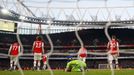 Soccer Football - Premier League - Arsenal v Chelsea - Emirates Stadium, London, Britain - December 29, 2019 Arsenal's Bernd Leno looks dejected with teammates after Jorg