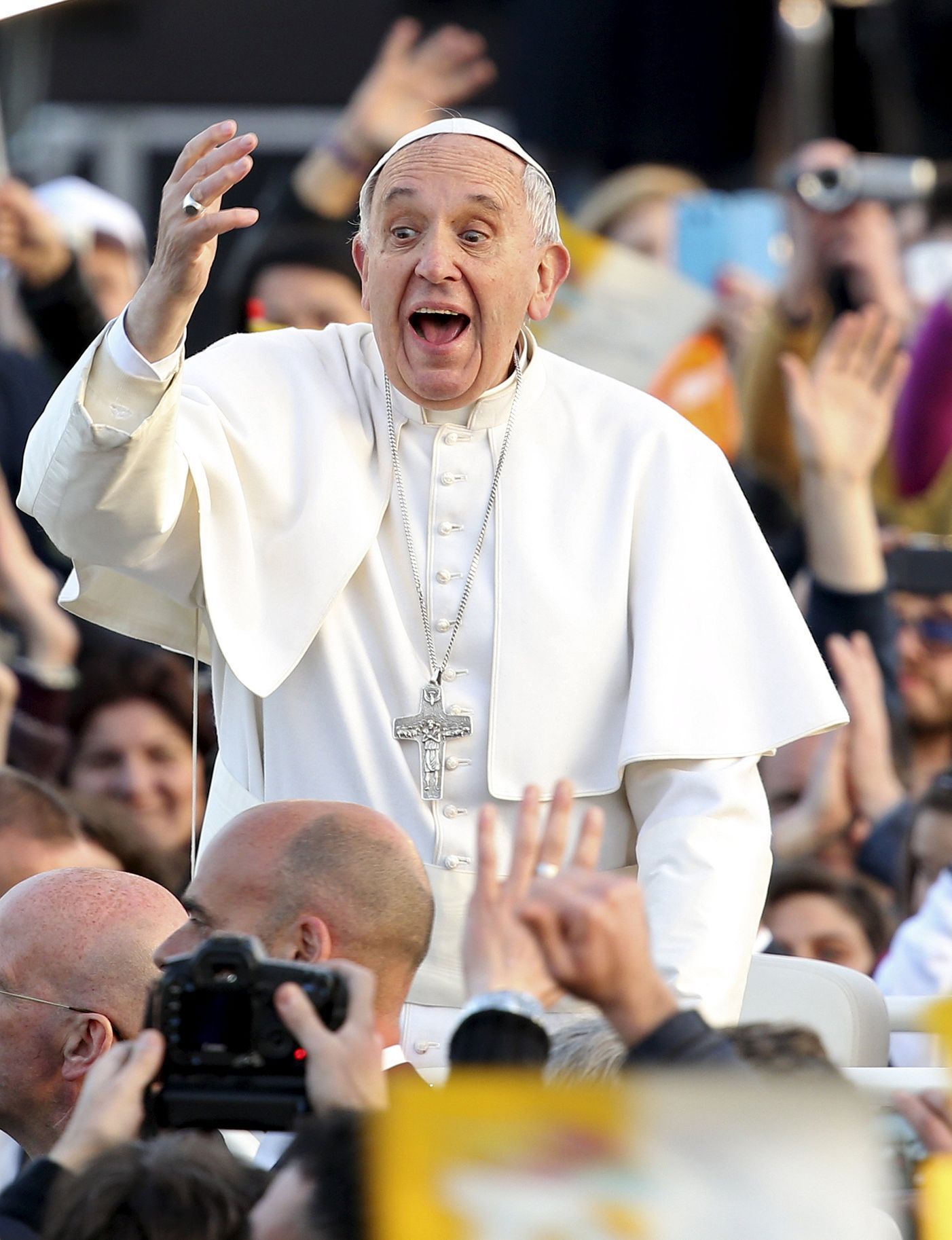 Pope Francis waves as he leaves at the end of meeting with youths at the seafront during his pastoral visit in Naples
