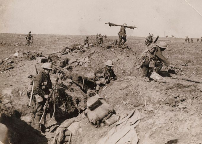 British troops advance during the battle of the Somme in this 1916 handout picture.