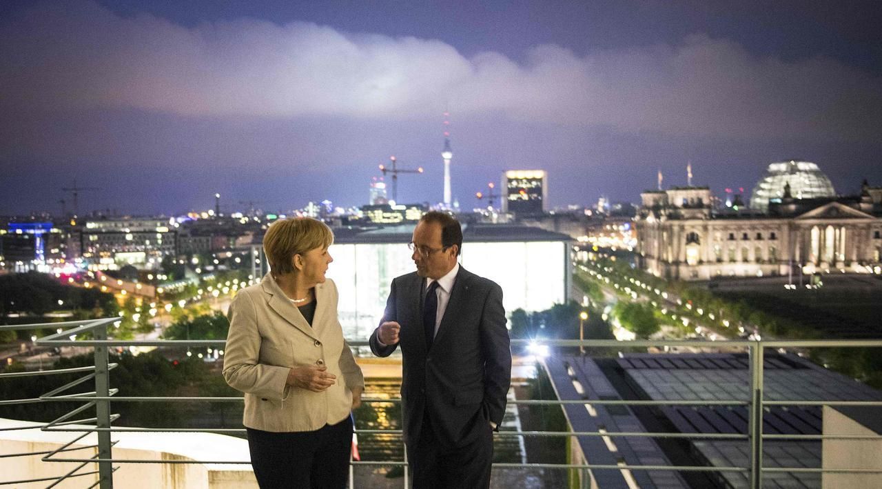 Merkelová a Hollande
