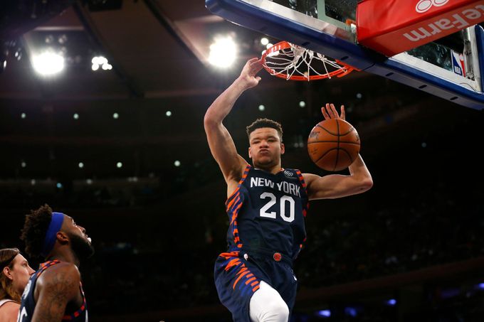 Mar 30, 2019; New York, NY, USA; New York Knicks forward Kevin Knox (20) dunks against the Miami Heat during the second half at Madison Square Garden. Mandatory Credit: N