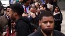 RNPS IMAGES OF THE YEAR 2012 - A man rubs his eyes as he waits in a line of jobseekers, to attend the Dr. Martin Luther King Jr. career fair held by the New York State department of Labor in New York April 12, 2012. A report on Friday showed the economy created only 120,000 jobs last month, the fewest since October. The unemployment rate fell to a three-year low of 8.2 percent, but largely as people gave up the search for work. REUTERS/Lucas Jackson (UNITED STATES - Tags: BUSINESS EMPLOYMENT TPX IMAGES OF THE DAY) Published: Pro. 5, 2012, 11:16 odp.