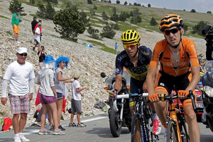 Team Saxo-Tinkoff rider Alberto Contador (L) of Spain and Euskaltel-Euskadi team rider Mikel Nieve Iturralde of Spain climb the Mont Ventoux during the 242.5 km fifteenth