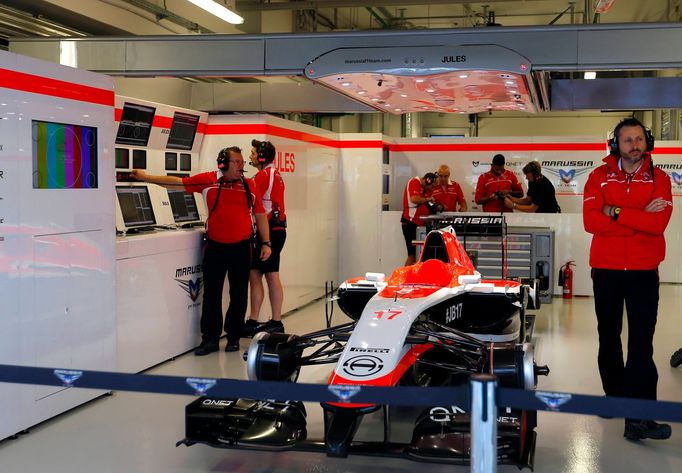 The car of Marussia Formula One driver Jules Bianchi of France is pictured in the garage during the first free practice session of the Russian F1 Grand Prix in the Sochi