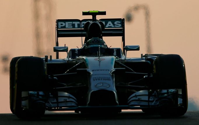 Mercedes Formula One driver Nico Rosberg of Germany leaves the pit during the Abu Dhabi F1 Grand Prix at the Yas Marina circuit in Abu Dhabi November 23, 2014. REUTERS/Ah