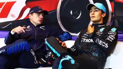 Piloti F1 Max Verstappen a George Russell