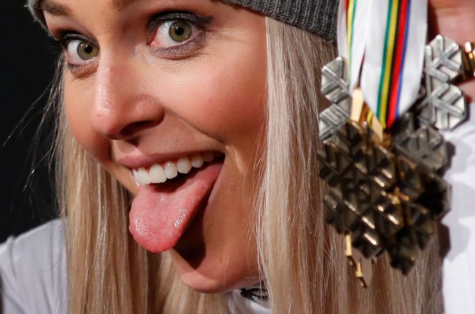 Alpine Skiing - FIS Alpine World Ski Championships - Women's Downhill - Are, Sweden - February 10, 2019 - Bronze medalist Lindsey Vonn of the U.S. poses with medals durin