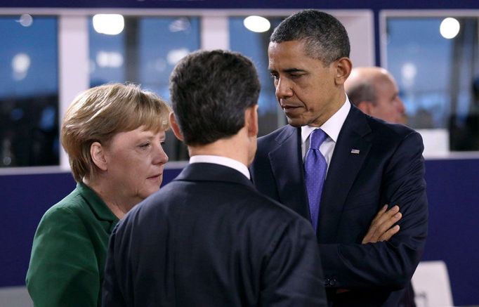 Ti, kteří drží v rukou moc světa, na summitu G20. Angela Merkelová, zády Nicolas Sarkozy, Barack Obama.