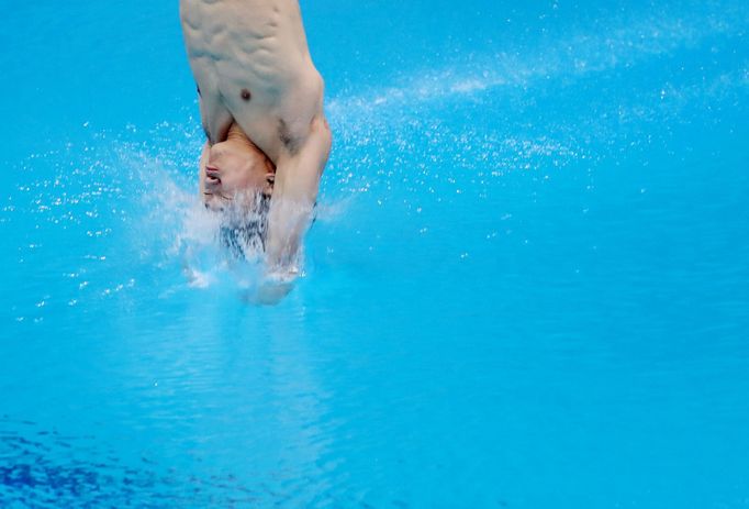 Diving - FINA Diving World Cup 2021 and Tokyo 2020 Olympics Aquatics Test Event - Tokyo Aquatics Centre, Tokyo, Japan - May 6, 2021 Korea's Haram Woo in action during the