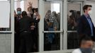 GOP poll challengers react after being asked to leave due to room capacity at the TCF Center after Election Day in Detroit, Michigan, U.S., November 4, 2020. REUTERS/Rebe