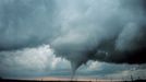 Project Vortex-99. Occluded mesocyclone tornado. Occluded means old circulation on a storm; this tornado was forming while the new circulation was beginning to form the tornadoes which preceeded the F5 Oklahoma City tornado. Photo #2 of sequence. Oklahoma 8 miles south of Anadarko. May 3, 1999. Credit: OAR/ERL/National Severe Storms Laboratory (NSSL).