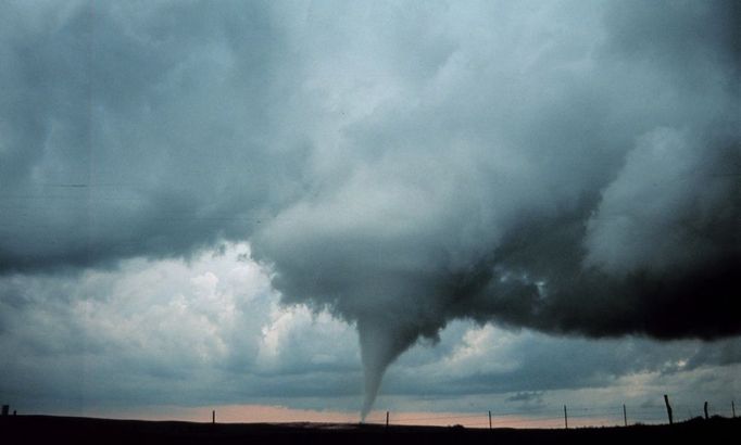 Project Vortex-99. Occluded mesocyclone tornado. Occluded means old circulation on a storm; this tornado was forming while the new circulation was beginning to form the tornadoes which preceeded the F5 Oklahoma City tornado. Photo #2 of sequence. Oklahoma 8 miles south of Anadarko. May 3, 1999. Credit: OAR/ERL/National Severe Storms Laboratory (NSSL).