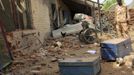 An armed soldier stands guard at the Talodi market in South Kordofan