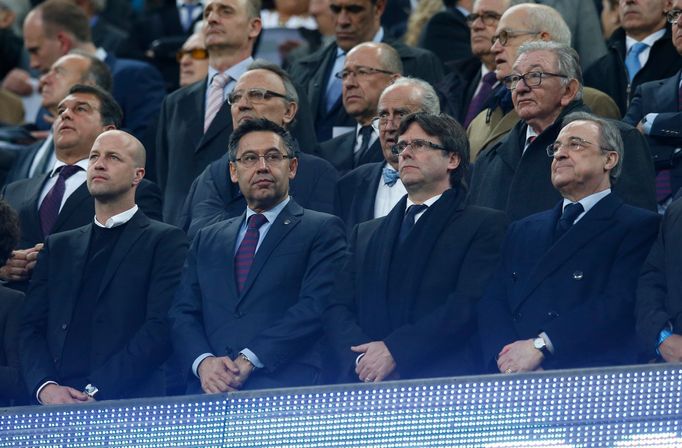 Barcelona President Josep Maria Bartomeu (2nd L) with Real Madrid president Florentino Perez (R) in the stands