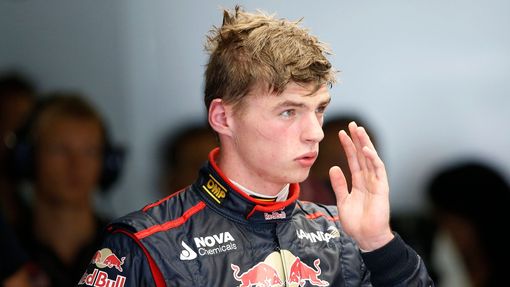 Toro Rosso Formula One driver Max Verstappen of the Netherlands returns to the garage after his car stalled on the track during the first practice session of the Japanese