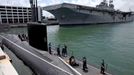 April 25, 2011 - Fort Lauderdale, Florida, U.S. - -- Fort Lauderdale, Fla. -- The USS Iwo Jima, an amphibious assault ship, and the USS Annapolis (SSN 760), a S6G nuclear reactor powered fast attack submarine, moored at Port Everglades in Fort Lauderdale on Monday. The USS Annapolis measures 362 ft. in length and 33 ft. at the beam, a diving depth of over 400 ft., 27+ mph, 12 vertical launch missile tubes, 4 torpedo tubes, and a crew of 130 enlisted submariners. The submarine was commissioned April 11, 1992 with its homeport in Groton, Connecticut. USS Annapolis sailed to the 21st Anniversary of Fleet Week at Port Everglades, Fort Lauderdale. (Credit Image: © Gary Coronado/The Palm Beach Post)