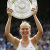 FILE PHOTO: Maria Sharapova of Russia celebrates as she wins Wimbledon