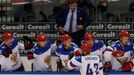 Russia's Artyom Anisimov (front) celebrates his goal against France during the first period of their men's ice hockey World Championship quarter-final game at Minsk Arena