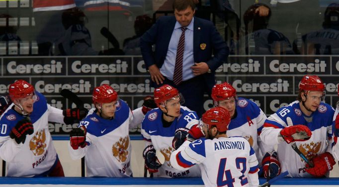 Russia's Artyom Anisimov (front) celebrates his goal against France during the first period of their men's ice hockey World Championship quarter-final game at Minsk Arena