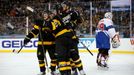 Boston Bruins defenseman Torey Krug (47), center Ryan Spooner (51) and right wing Jimmy Hayes (11) celebrate a third period goal by left wing Matt Beleskey (39)