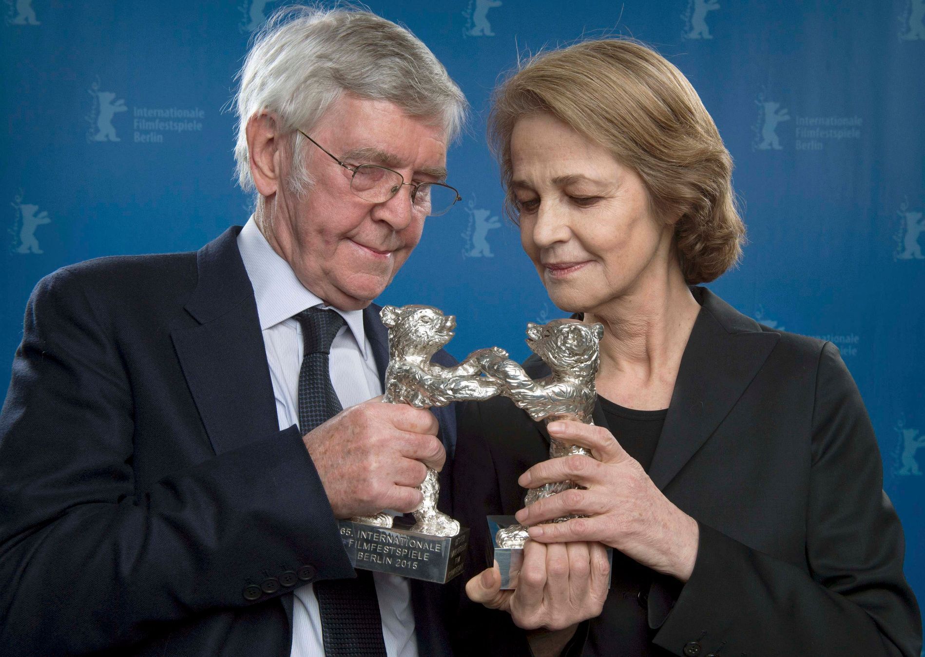 Actors Courtenay and Rampling pose with their Silver Bears for Best Actor and Best Actress after 65th Berlinale International Film Festival in Berlin
