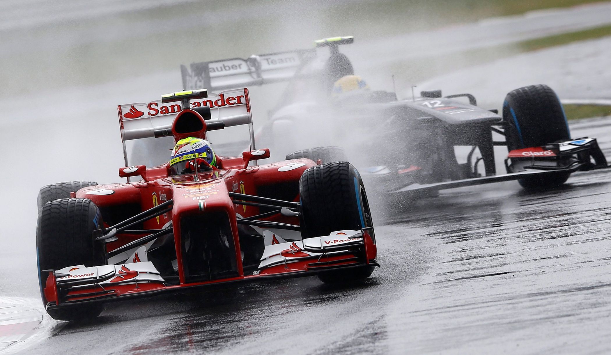 Ferrari Formula One driver Massa takes corner during first p
