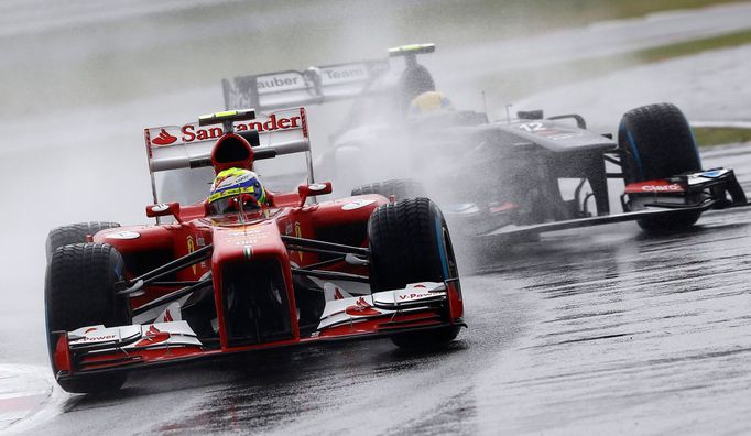 Ferrari Formula One driver Felipe Massa of Brazil takes a corner during the first practice session for the British Grand Prix at the Silverstone Race circuit, central Eng