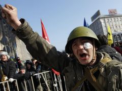 An anti-government protester cheers during a rally in Kiev February 21, 2014.