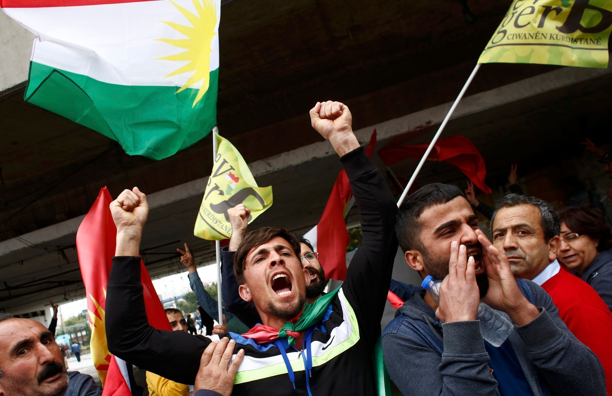 People wave Kurdistan flag and shout during a May Day demonstration in Istanbul