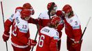 Denmark's Stefan Lassen (C) celebrates his goal against the Czech Republic with team mates during the first period of their men's ice hockey World Championship Group A ga