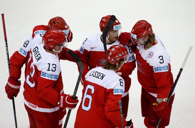 Denmark's Stefan Lassen (C) celebrates his goal against the Czech Republic with team mates during the first period of their men's ice hockey World Championship Group A ga