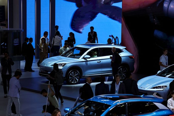 A general view of visitors looking at models from BYD, a Chinese automobile manufacturer, during an event a day ahead of the official opening of the 2023 Munich Auto Show