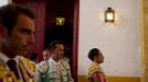 Spanish matador Salvador Cortes, Colombian matador Luis Bolivar and assistant Francisco J. Tornay wait before the start of a bullfight in The Maestranza bullring in Seville