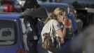 Relatives of the victims of the Kiss nightclub fire cry in the southern city of Santa Maria, 187 miles (301 km) west of the state capital of Porto Alegre, in this picture taken by Agencia RBS, January 27, 2013. At least 200 people were killed in the nightclub fire in southern Brazil on Sunday after a band's pyrotechnics show set the building ablaze, and fleeing patrons were unable to find the emergency exits, local officials said. Bodies were still being removed from the Kiss nightclub in the southern city of Santa Maria, Major Gerson da Rosa Ferreira, who was leading rescue efforts at the scene for the military police, told Reuters. Local officials said 180 people were confirmed dead, and Ferreira said the death toll would rise above 200. He said the victims died of asphyxiation, or from being trampled, and that there were possibly as many as 500 people inside the club when the fire broke out at about 2:30 a.m. REUTERS/Ronald Mendes/Agencia RBS (BRAZIL - Tags: DISASTER) ATTENTION EDITORS - THIS IMAGE WAS PROVIDED BY A THIRD PARTY. NO SALES. NO ARCHIVES. FOR EDITORIAL USE ONLY. NOT FOR SALE FOR MARKETING OR ADVERTISING CAMPAIGNS. THIS IMAGE HAS BEEN SUPPLIED BY A THIRD PARTY. BRAZIL OUT. NO COMMERCIAL OR EDITORIAL SALES IN BRAZIL. THIS PICTURE IS DISTRIBUTED EXACTLY AS RECEIVED BY REUTERS, AS A SERVICE TO CLIENTS Published: Led. 27, 2013, 2:57 odp.