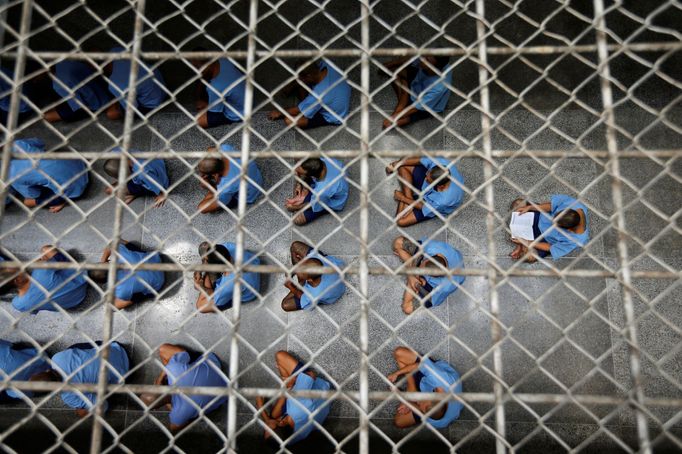 Inmates sit on the floor during an inspection visit in the long-term sentence zone inside Klong Prem high-security prison in Bangkok, Thailand July 12, 2016.