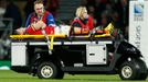 Scott Williams of Wales is stretchered off injured