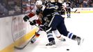 Oct 17, 2014; Columbus, OH, USA; Columbus Blue Jackets right wing Corey Tropp (26) battles for the puck against Calgary Flames defenseman Ladislav Smid (15) during the se