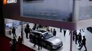 Visitors check a Cyrus Huawei Smart Selection SF5 electric vehicle (EV) displayed at the Huawei booth during a media day for the Auto Shanghai show in Shanghai, China Apr