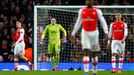 Football: Arsenal's David Ospina, Kieran Gibbs and Hector Bellerin look dejected with team mates