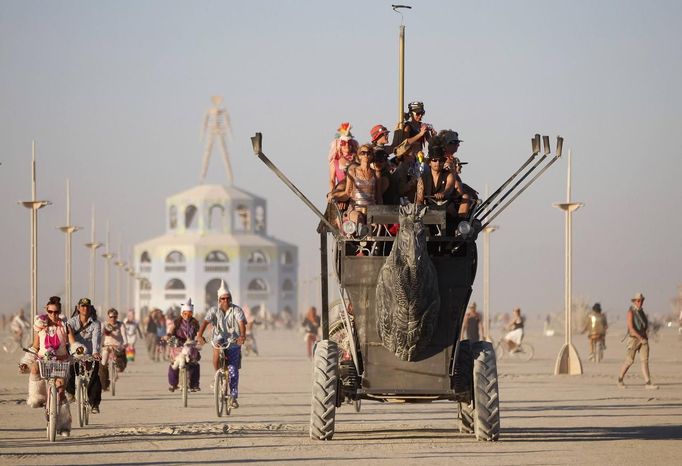 Participants ride an art car during the Burning Man 2012 "Fertility 2.0" arts and music festival in the Black Rock Desert of Nevada August 29, 2012. More than 60,000 people from all over the world have gathered at the sold out festival, which is celebrating its 26th year, to spend a week in the remote desert cut off from much of the outside world to experience art, music and the unique community that develops.