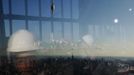 Members of the media are reflected in the windows of the 100th floor observation deck in One World Trade Center before a press conference in New York, April 2, 2013. Port Authority officials unveiled Tuesday the stunning view from the top of One World Trade Center, a 360-degree eagle�s eye panorama that will instantly become one of the city�s premiere tourist attractions when it is completed in 2015. REUTERS/Lucas Jackson (UNITED STATES - Tags: CITYSPACE BUSINESS CONSTRUCTION) Published: Dub. 2, 2013, 4:37 odp.