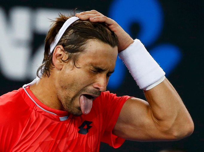 David Ferrer slavil vítězství nad Gillesem Simonem po svém.