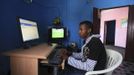 Somali athlete Abdullah Bare Kuulow browses the internet at a cyber-cafe after a training session during their preparations for the 2012 London Olympic Games in Somalia's capital Mogadishu in this March 14, 2012 file photo. Training in a bullet-riddled stadium where the remains of a rocket propelled grenade lies discarded on the track's edge counts as progress for Somali Olympic hopeful Mohamed Hassan Mohamed. A year ago, Mogadishu's Konis stadium was a base for Islamist militants and a work out meant at times running through the streets, dodging gun-fire and mortar shells in one of the world's most dangerous cities. To match OLY-SOMALIA-HOPES/ REUTERS/Feisal Omar/Files (SOMALIA - Tags: SPORT ATHLETICS SOCIETY OLYMPICS SCIENCE TECHNOLOGY) Published: Čer. 11, 2012, 6:45 dop.