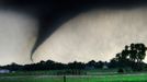 Tornado One of over 100 tornadoes reported in the Central Plains during a torando outbreak on Saturday, April 15, 2012. A deadly torando touched down near Woowdard, OK later that night killing 6 and leaving many injured. This dangerous tornado was shot south of Cheyenne, OK. at sunset. Oklahoma,USA