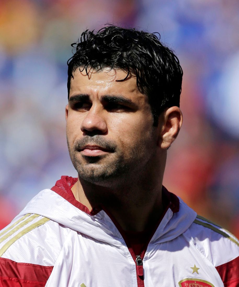 File picture shows Spain's Diego Costa standing for his national anthem before an international friendly soccer match against El Salvador in Maryland