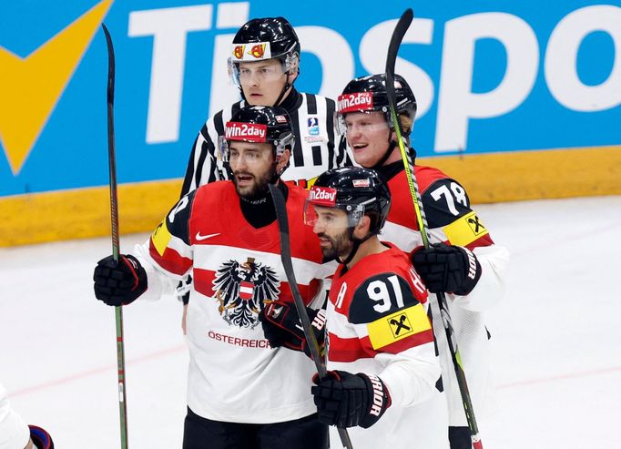 Ice Hockey - IIHF World Championships - Group A - Canada v Austria - Prague Arena, Prague, Czech Republic - May 14, 2024 Austria's Benjamin Nissner celebrates scoring the