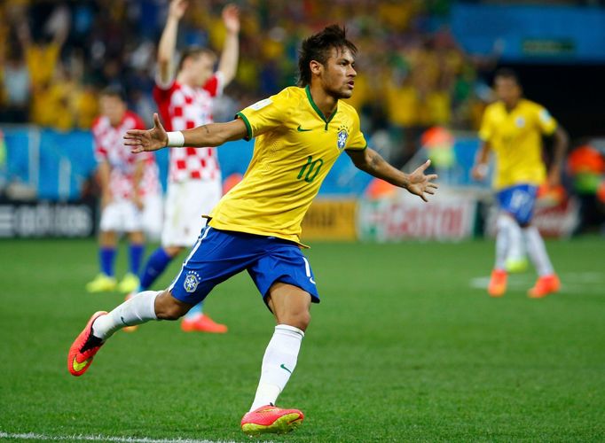 Brazil's Neymar celebrates his goal against Croatia during their 2014 World Cup opening match at the Corinthians arena in Sao Paulo June 12, 2014. REUTERS/Damir Sagolj (B