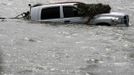 A submerged truck sits along Highway 23 after Hurricane Isaac at Plaquemines Parish, Louisiana August 30, 2012. REUTERS/Sean Gardner (UNITED STATES - Tags: ENVIRONMENT DISASTER) Published: Srp. 30, 2012, 5:14 odp.